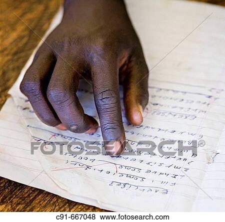 Boy's hand at school. Ethiopia View Large Photo Image Stock Photo - Boy's hand at school. Ethiopia. Fotosearch