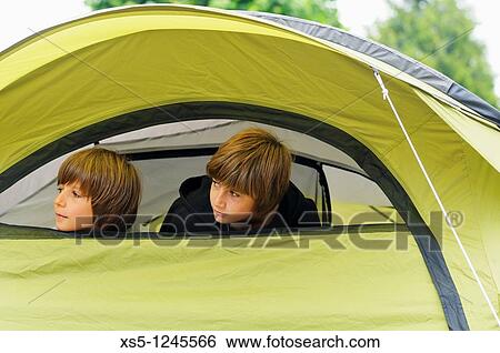 Boys in a tent View Large Photo Image Stock Photograph - Boys in a tent. Fotosearch