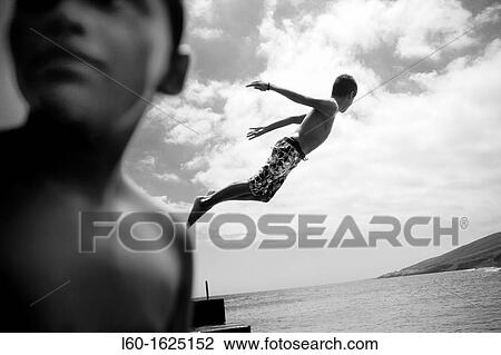 Boys in the G? imar harbour, Tenerife, Canary Islands, Spain View Large Photo Image Stock Image - Boys in the G? imar harbour, Tenerife, Canary Islands, Spain. Fotosearch