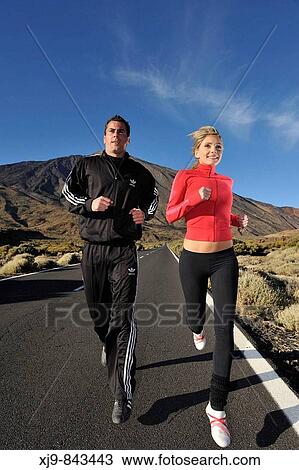 Boys joggin on the the volcano Teide road. View Large Photo Image Stock Image - Boys joggin on the the volcano Teide road.. Fotosearch