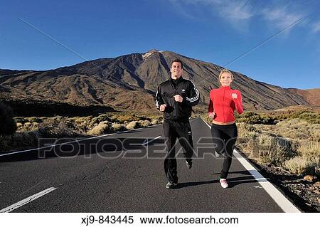 Boys joggin on the the volcano Teide road. View Large Photo Image Stock Photography - Boys joggin on the the volcano Teide road.. Fotosearch