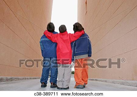 Stock Image - Boys Looking Up. Fotosearch