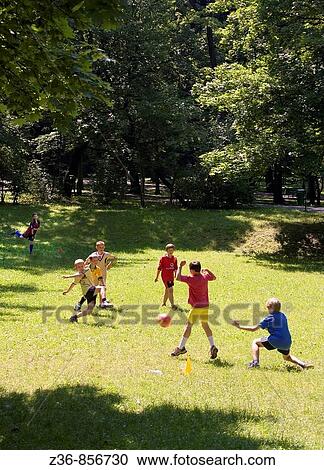 Stock Image - boys play succer ball. Fotosearch