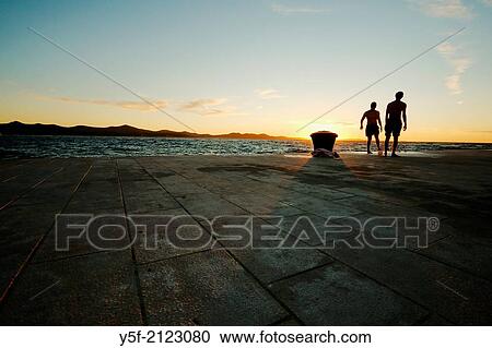 Boys playing football close to the Adriatic sea at Zadar. View Large Photo Image Stock Image - Boys playing football close to the Adriatic sea at Zadar.. Fotosearch