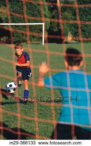 Boys playing soccer. View Large Photo Image Stock Image - Boys playing soccer.. Fotosearch