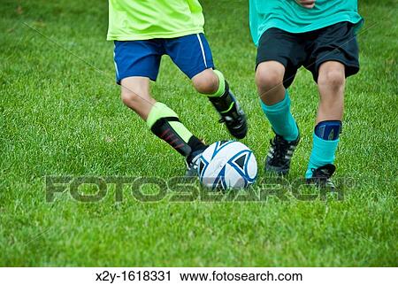 Boys youth soccer game View Large Photo Image Stock Image - Boys youth soccer game. Fotosearch