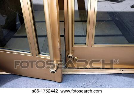 Brass and Glass Double French Doors Slightiy Opened View Large Photo Image Stock Image - Brass and Glass Double French Doors Slightiy Opened. Fotosearch