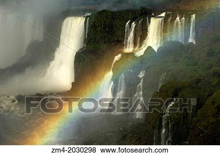 BRAZIL, IGUASSU NATIONAL PARK, IGUASSU FALLS, VIEW OF ARGENTINEAN SIDE, RAINBOW. 1015 View Large Photo Image Stock Photo - BRAZIL, IGUASSU NATIONAL PARK, IGUASSU FALLS, VIEW OF ARGENTINEAN SIDE, RAINBOW. 1015. Fotosearch
