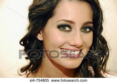 Brazilian young model of green eyes and black hair smiling to the camera. Close up. View Large Photo Image Stock Photography - Brazilian young model of green eyes and black hair smiling to the camera. Close up.. Fotosearch