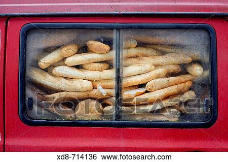 Bread baguettes in a van, Santoa, Cantabria, Spain View Large Photo Image Stock Photograph - Bread baguettes in a van, Santoa, Cantabria, Spain. Fotosearch