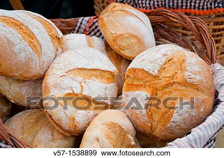 Bread in a basket, close view. Spain. View Large Photo Image Stock Photo - Bread in a basket, close view. Spain.. Fotosearch