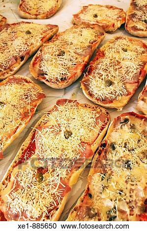 Stock Image - Bread with jam and chesse. Fira del cavall? 09, Sabadell, Barcelona province, Catalonia, Spain. Fotosearch
