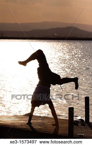 Breakdance at sunset View Large Photo Image Stock Photo - Breakdance at sunset. Fotosearch
