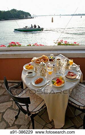Breakfast in the Hotel Cipriani Terrace. Giudecca island. Venice. Venetia. Italy View Large Photo Image Stock Photo - Breakfast in the Hotel Cipriani Terrace. Giudecca island. Venice. Venetia. Italy. Fotosearch