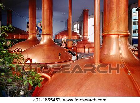 Stock Image - Brewing room with mash tun copper tanks, Kronenbourg brewery, Strasbourg, Alsace, France. Fotosearch