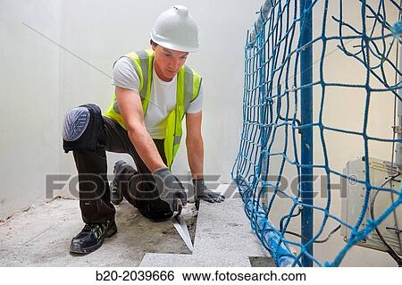 Bricklayer with a trowel. Construction of residential building. Donostia. San Sebastian. Gipuzkoa. Basque Country. Spain. View Large Photo Image Stock Photograph - Bricklayer with a trowel. Construction of residential building. Donostia. San Sebastian. Gipuzkoa. Basque Country. Spain.. Fotosearch