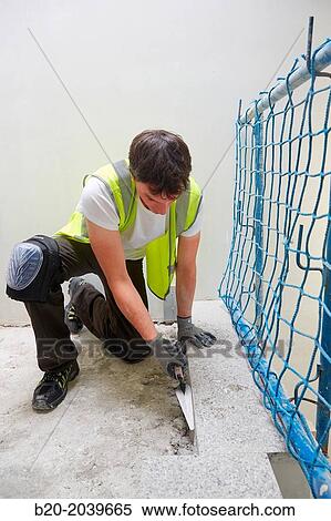 Bricklayer with a trowel. Construction of residential building. Donostia. San Sebastian. Gipuzkoa. Basque Country. Spain. View Large Photo Image Stock Photography - Bricklayer with a trowel. Construction of residential building. Donostia. San Sebastian. Gipuzkoa. Basque Country. Spain.. Fotosearch