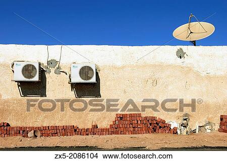 Picture - Bricks antenna and fan - Dahab, Sinai Peninsula - Egypt.. Fotosearch