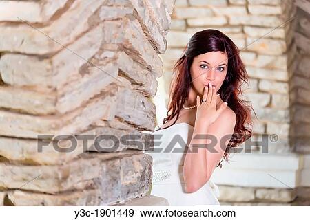 Bridal portrait - A young bride in wedding dress posing at historical looking building at Garner State Park, Concan, Texas, USA, Female Caucasian, 23 years old View Large Photo Image Stock Photo - Bridal portrait - A young bride in wedding dress posing at historical looking building at Garner State Park, Concan, Texas, USA, Female Caucasian, 23 years old. Fotosearch