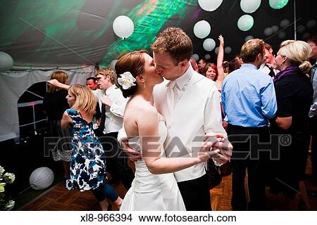 Picture - bride and groom dancing. Fotosearch