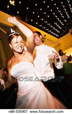 Bride and groom dancing View Large Photo Image Stock Image - Bride and groom dancing. Fotosearch