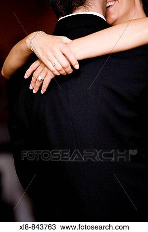 Stock Image - bride and groom dancing. Fotosearch