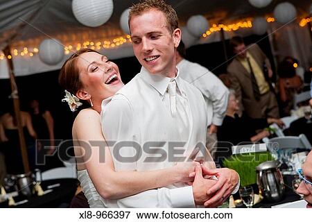 Stock Photo - bride and groom dancing. Fotosearch