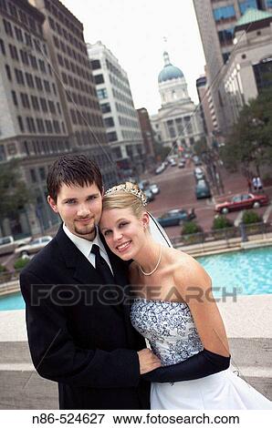 Bride and groom in city View Large Photo Image Stock Photo - Bride and groom in city. Fotosearch