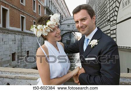 Bride and Groom in front of the bridge of Sighs Venice Italy View Large Photo Image Picture - Bride and Groom in front of the bridge of Sighs Venice Italy. Fotosearch