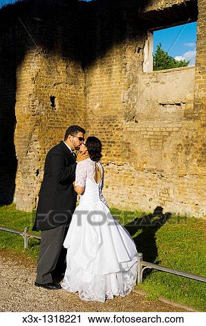 Bride and groom kissing in Giardino degli Aranci in Rome, Italy View Large Photo Image Stock Image - Bride and groom kissing in Giardino degli Aranci in Rome, Italy. Fotosearch