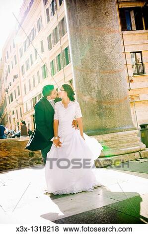 Bride and groom kissing outside of Pantheon, Rome, Italy View Large Photo Image Stock Photo - Bride and groom kissing outside of Pantheon, Rome, Italy. Fotosearch