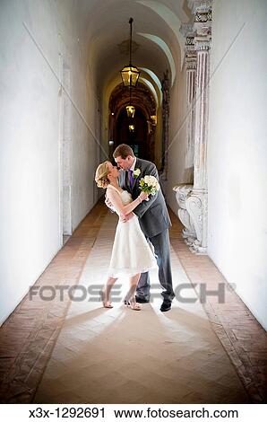 Bride and groom kissing View Large Photo Image Stock Image - Bride and groom kissing. Fotosearch