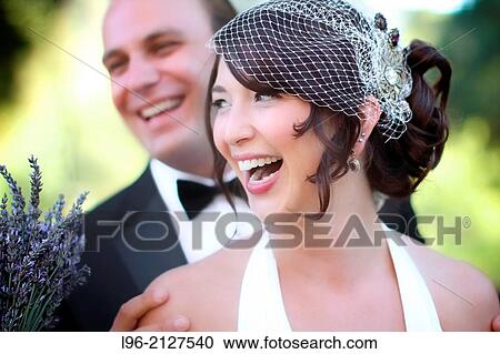 bride and groom laughing, enjoying a moment View Large Photo Image Stock Image - bride and groom laughing, enjoying a moment. Fotosearch