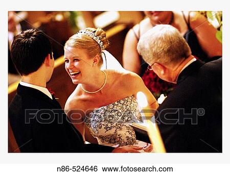 Bride and groom laughing View Large Photo Image Stock Photograph - Bride and groom laughing. Fotosearch
