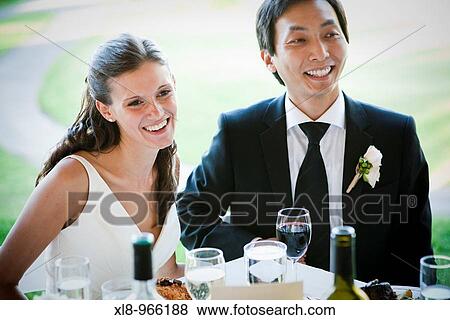 bride and groom laughing, wedding reception View Large Photo Image Stock Photo - bride and groom laughing, wedding reception. Fotosearch