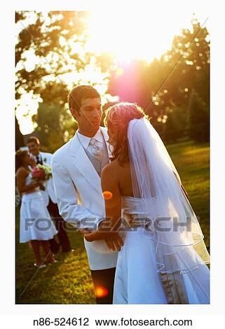 Bride and groom outside View Large Photo Image Stock Image - Bride and groom outside. Fotosearch