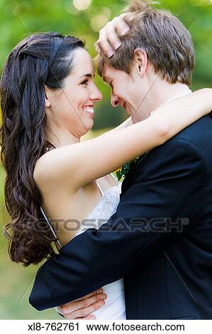 Bride and Groom smiling View Large Photo Image Stock Image - Bride and Groom smiling. Fotosearch