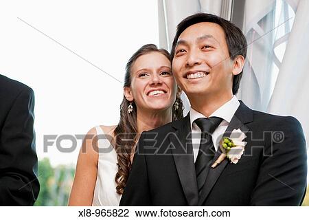 Bride and groom smiling View Large Photo Image Stock Image - Bride and groom smiling. Fotosearch