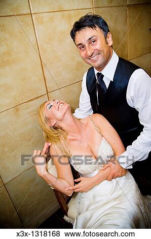 Stock Photo - Bride and groom smiling. Fotosearch