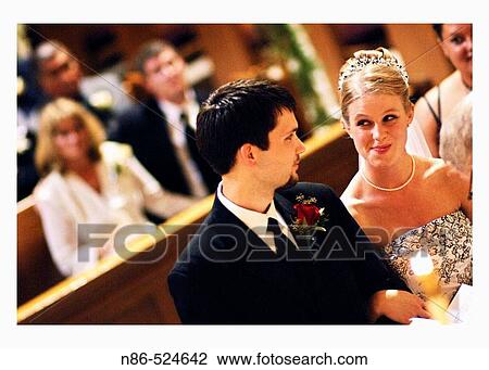 Stock Image - Bride and groom together smiling. Fotosearch