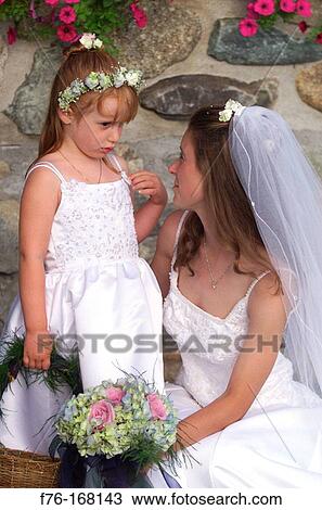 Bride and little bridesmaid View Large Photo Image Stock Image - Bride and little bridesmaid. Fotosearch