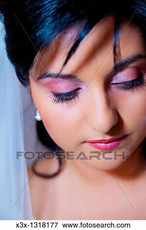 Bride close up with a wedding veil View Large Photo Image Stock Photo - Bride close up with a wedding veil. Fotosearch