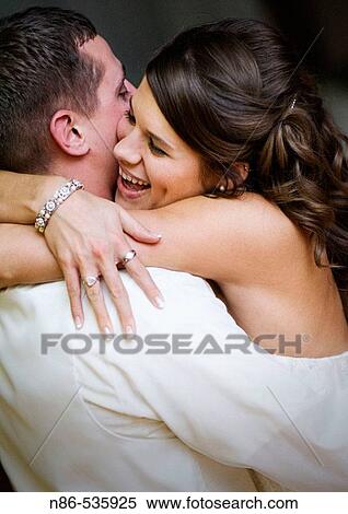 Stock Photography - Bride dancing with groom. Fotosearch