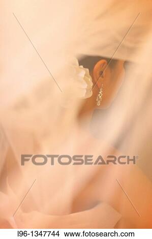 Picture - bride getting ready for weddng. Fotosearch