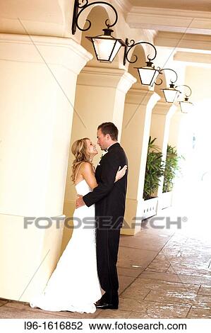 bride groom happy embrace wedding reception in wedding dress tux View Large Photo Image Stock Image - bride groom happy embrace wedding reception in wedding dress tux. Fotosearch