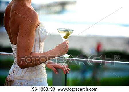 Bride holding Martini glass View Large Photo Image Stock Photo - Bride holding Martini glass. Fotosearch