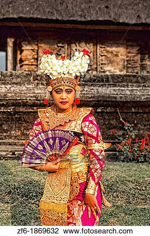 Bride in full traditional dress in beautiful religious temple in Bali Indonesia Lake Bratan Ulur Danu Temple View Large Photo Image Stock Image - Bride in full traditional dress in beautiful religious temple in Bali Indonesia Lake Bratan Ulur Danu Temple. Fotosearch