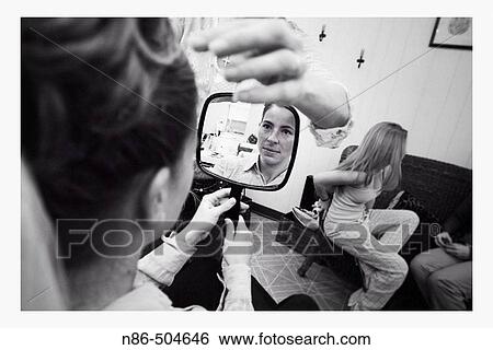 Bride looking into mirror View Large Photo Image Stock Photograph - Bride looking into mirror. Fotosearch