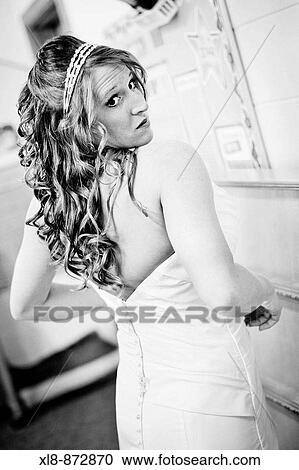 Stock Image - Bride looking over her shoulder. Fotosearch