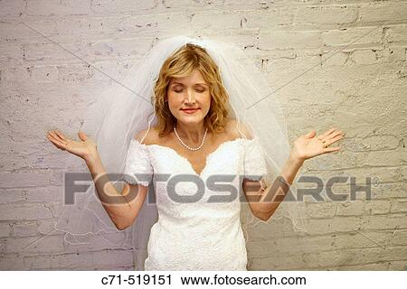 Bride meditating View Large Photo Image Stock Image - Bride meditating. Fotosearch